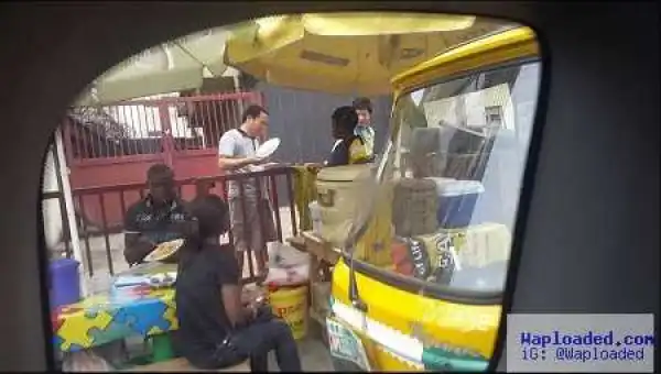 Unbelievable!! See What Chinese Men Were Spotted Doing Publicly in Ikeja, Lagos (Photos)